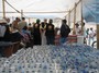 Delivering water, food and supplies to Rosario